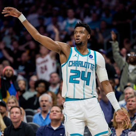 Brandon Miller watches his shot in the first half against the Miami Heat.