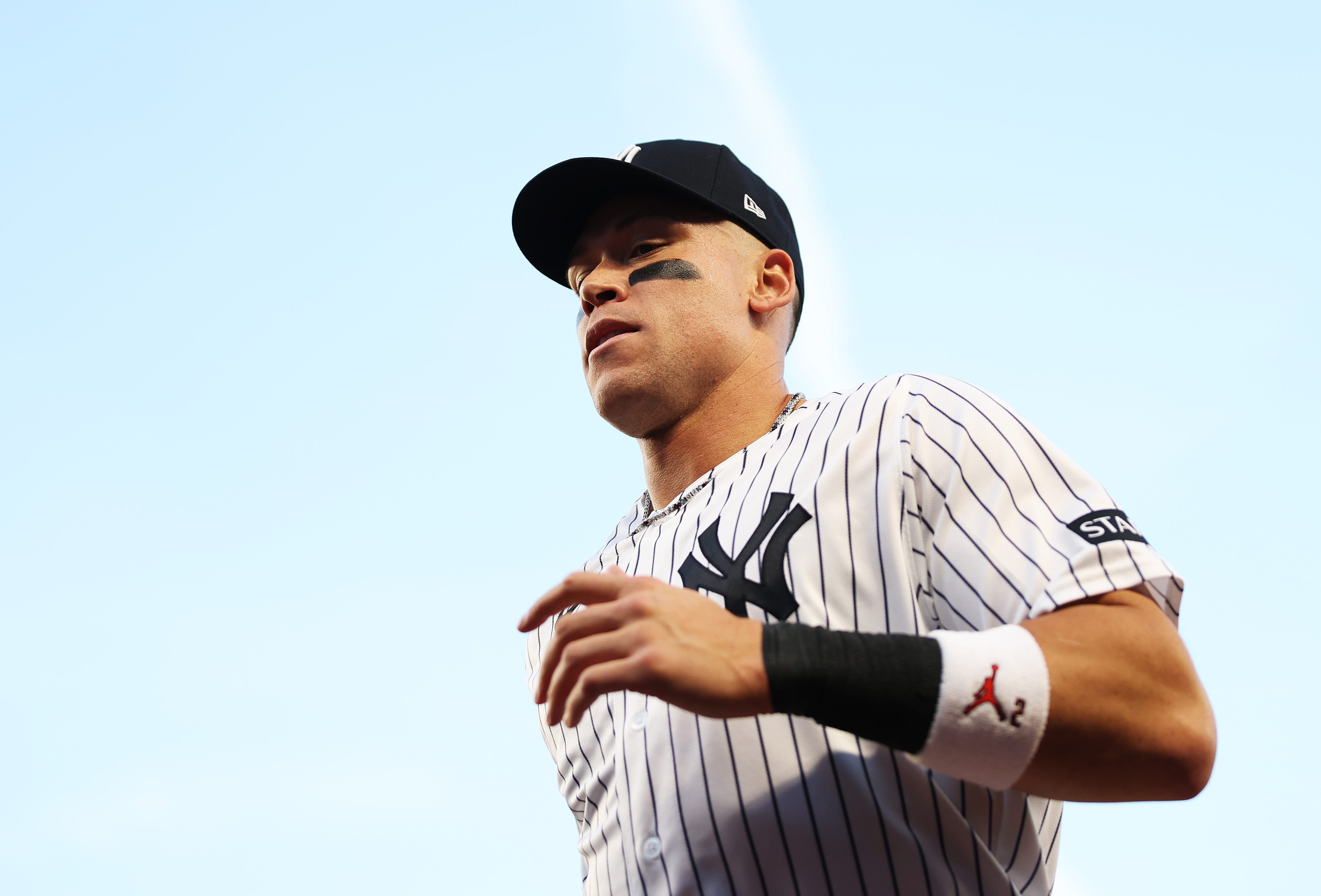 Yankees fans cheering at the stadium