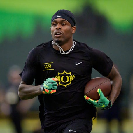 Oregon wide receiver Malik Benson carries the ball during Oregon Pro Day on March 17, 2026, at the Moshofsky Center in Eugene, Oregon.