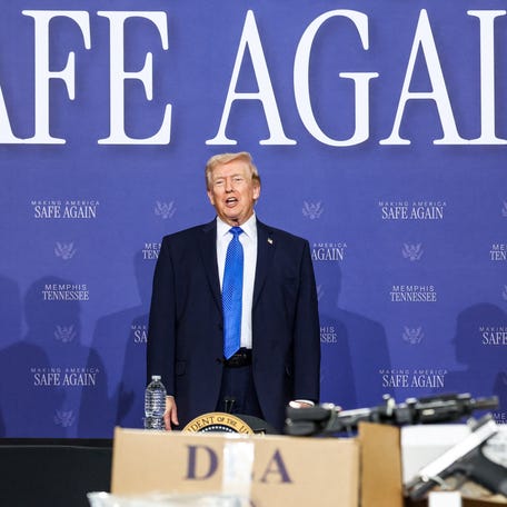 U.S. Defense Secretary Pete Hegseth and then-Attorney General Pam Bondi applaud as U.S. President Donald Trump speaks at a roundtable on public safety at Memphis Air National Guard Base in Memphis, Tennessee, U.S., March 23, 2026.