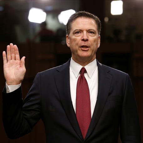 Former FBI Director James Comey is sworn in prior to testifying before a Senate Intelligence Committee hearing in Washington, DC, on June 8, 2017.