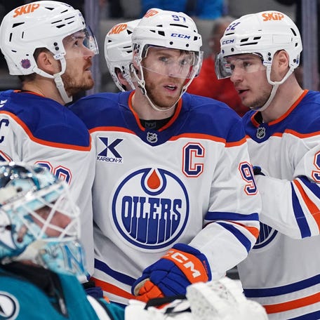 Apr 8, 2026; San Jose, California, USA; Edmonton Oilers center Connor McDavid (97) is congratulated by teammates after scoring against the San Jose Sharks during the first period at SAP Center at San Jose. Mandatory Credit: David Gonzales-Imagn Images