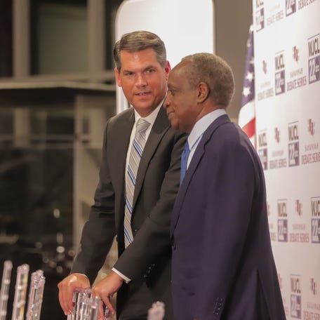 Geoff Duncan talks with Mike Thurman during the Savannah Debate Series Democratic Gubernatorial forum on Thursday, January 8, 2026 at Jonesville Baptist Church in Savannah.