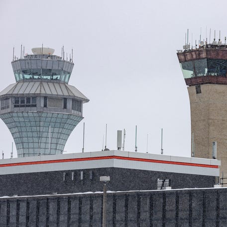 CHICAGO, ILLINOIS - NOVEMBER 30: FAA air traffic control towers after a winter snow storm affected the area at O'Hare International airport on November 30, 2025 in Chicago, Illinois.