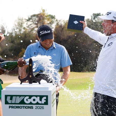Richard T. Lee and Bjorn Hellgren are sprayed with Champagne after taking the top two spots in the LIV Golf Black Diamond Ranch Promotions golf tournament at Black Diamond Ranch on Jan. 11, 2026, in Lecanto, Florida.