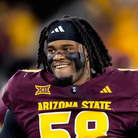 Arizona State Sun Devils offensive lineman Max Iheanachor stands on the sideline during a game against the Arizona Wildcats on Nov. 25 at Mountain America Stadium.