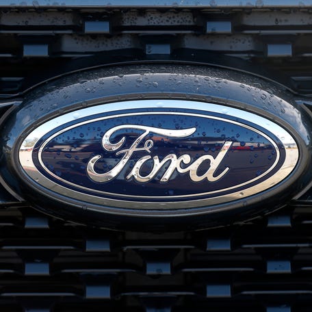 The Ford logo is visible on a pickup truck displayed on the sales lot at Serramonte Ford on Jan. 6, 2026 in Colma, California.
