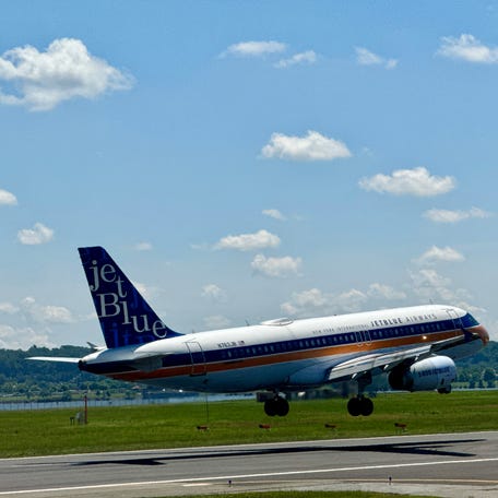 A JetBlue airlines plane comes in to land at Chicago's O'Hare International airport on May 22, 2024.