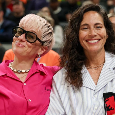 Megan Rapinoe and Sue Bird pose for a photo during the 2025 WNBA All Star Skills Challenge at Gainbridge Fieldhouse on Jul 18, 2025 in Indianapolis, IN.