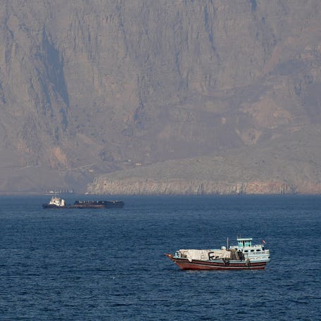 Ships and tankers in the Strait of Hormuz off the coast of Musandam, Oman, April 18, 2026.