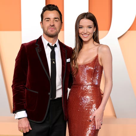 Justin Theroux, left, and Nicole Brydon Bloom attend the Vanity Fair Oscar party on March 2, 2025, in Beverly Hills, California.
