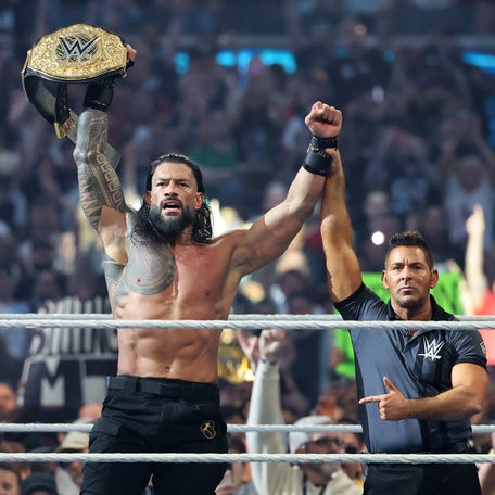 Roman Reigns celebrates after defeating CM Punk during the World Heavyweight Championship match during WrestleMania 42 at Allegiant Stadium on April 19, 2026 in Las Vegas, Nevada.
