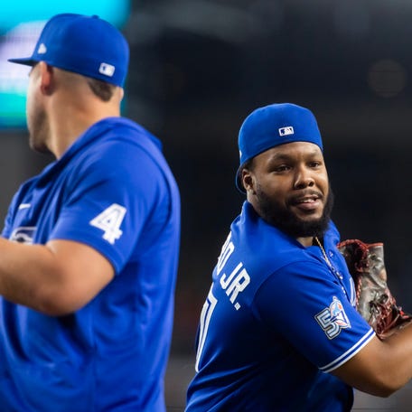 George Springer and Vladimir Guerrero Jr. after a win in Arizona.
