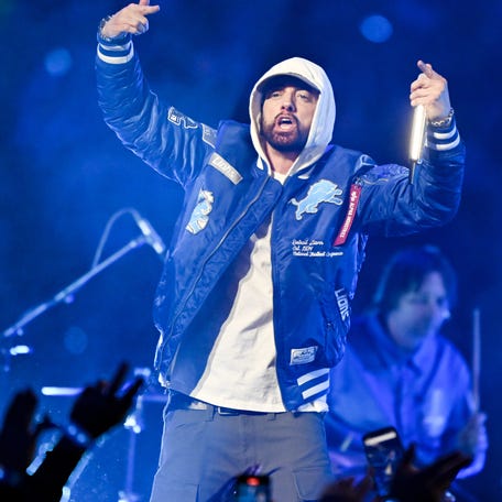 Eminem performs during halftime of the game between the Green Bay Packers and Detroit Lions at Ford Field.