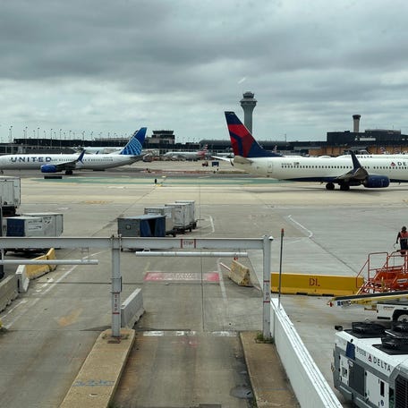 Delta Air Lines and United Airlines planes at Chicago O'Hare International Airport.