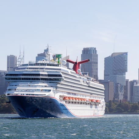 The Carnival Splendor cruise ship sailing with the skyline in the background in Sydney in the state of New South Wales in southeastern Australia on February 13, 2025.