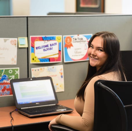 Michigan State University senior Olivia Murray, on Thursday, April 11, 2024, at the MSU Career Services Network office where she works as a lead marketing and event intern. Murray had several internships during college but has struggled to find a full-time job in her field of interpersonal communications.