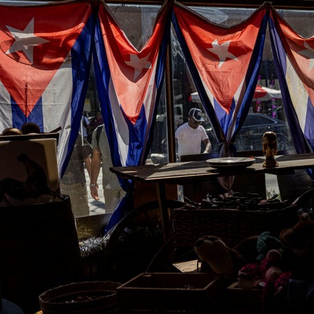 Cuban flags hang inside a store along Calle Ocho in the Little Havana neighborhood in Miami, Florida, U.S., February 27, 2026. REUTERS/Eva Marie Uzcategui