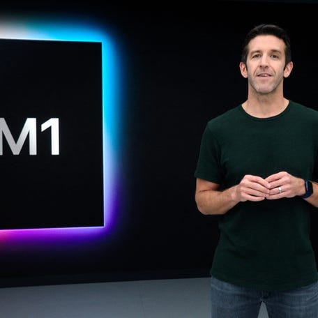 This handout released and taken on Nov. 10, 2020 by Apple inc. shows Apple's vice president of Hardware Engineering John Ternus unveiling M1, the first chip designed specifically for the Mac during a special event at Apple Park in Cupertino, Calif.