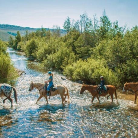 Horseback riding at C Lazy U Ranch.