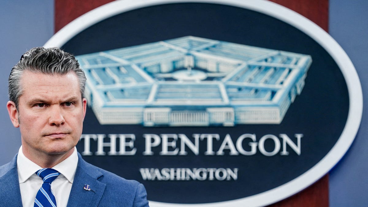 Secretary of Defense Pete Hegseth looks on during a briefing on the Iran war, at the Pentagon in Washington, D.C., U.S., April 16, 2026.