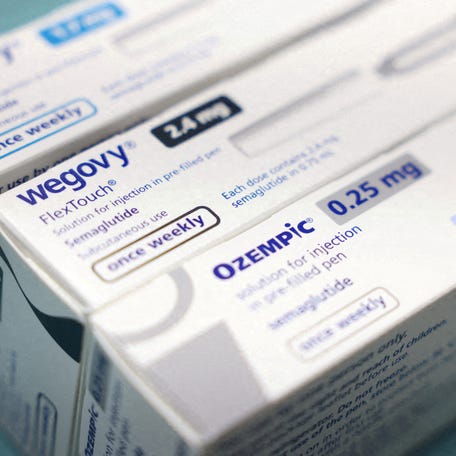 Ozempic and Wegovy boxes made by Novo Nordisk are pictured at a pharmacy in London on March 8, 2024.
