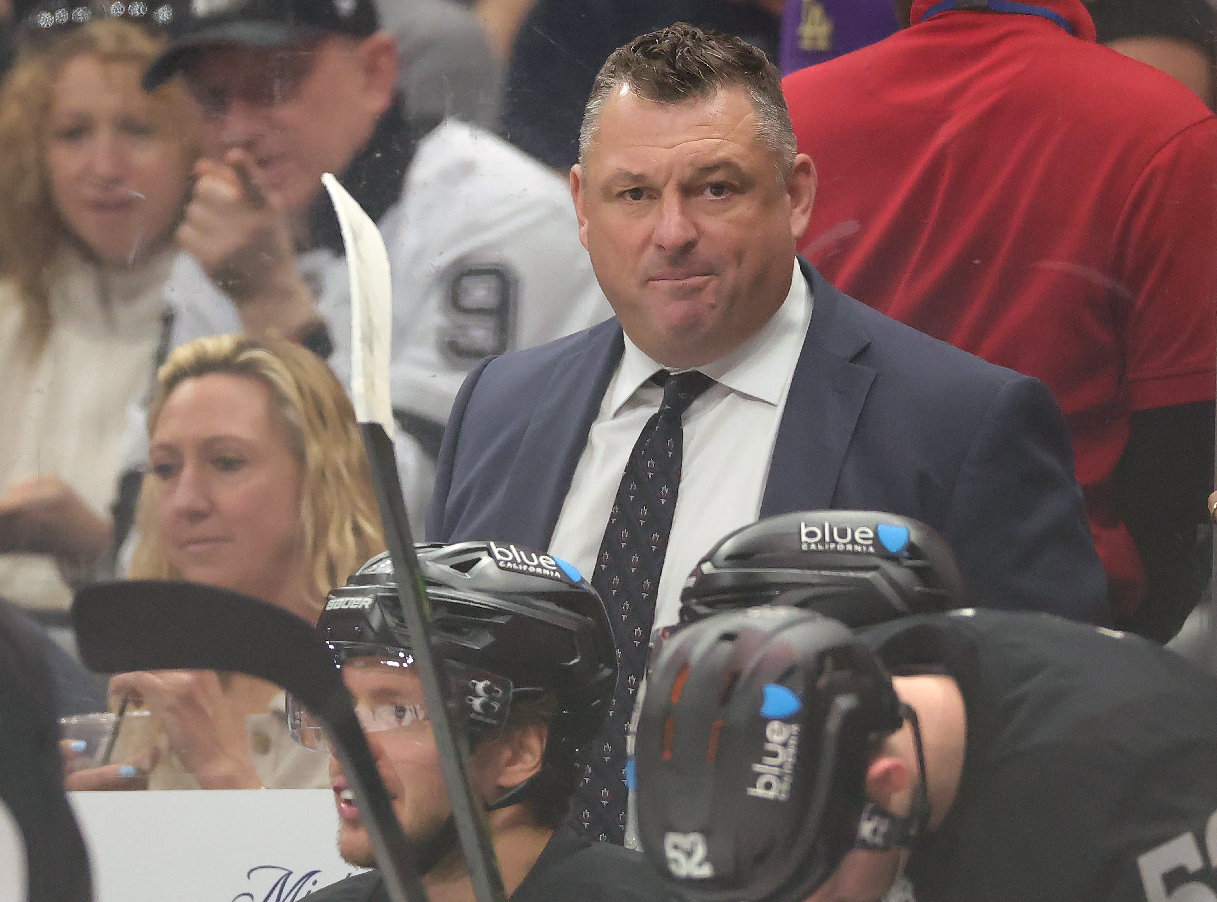 Fans got overly excited during Game 2 between the Kings and the Avalanche, causing a glass panel to collapse onto Kings interim coach, D.J. Smith.