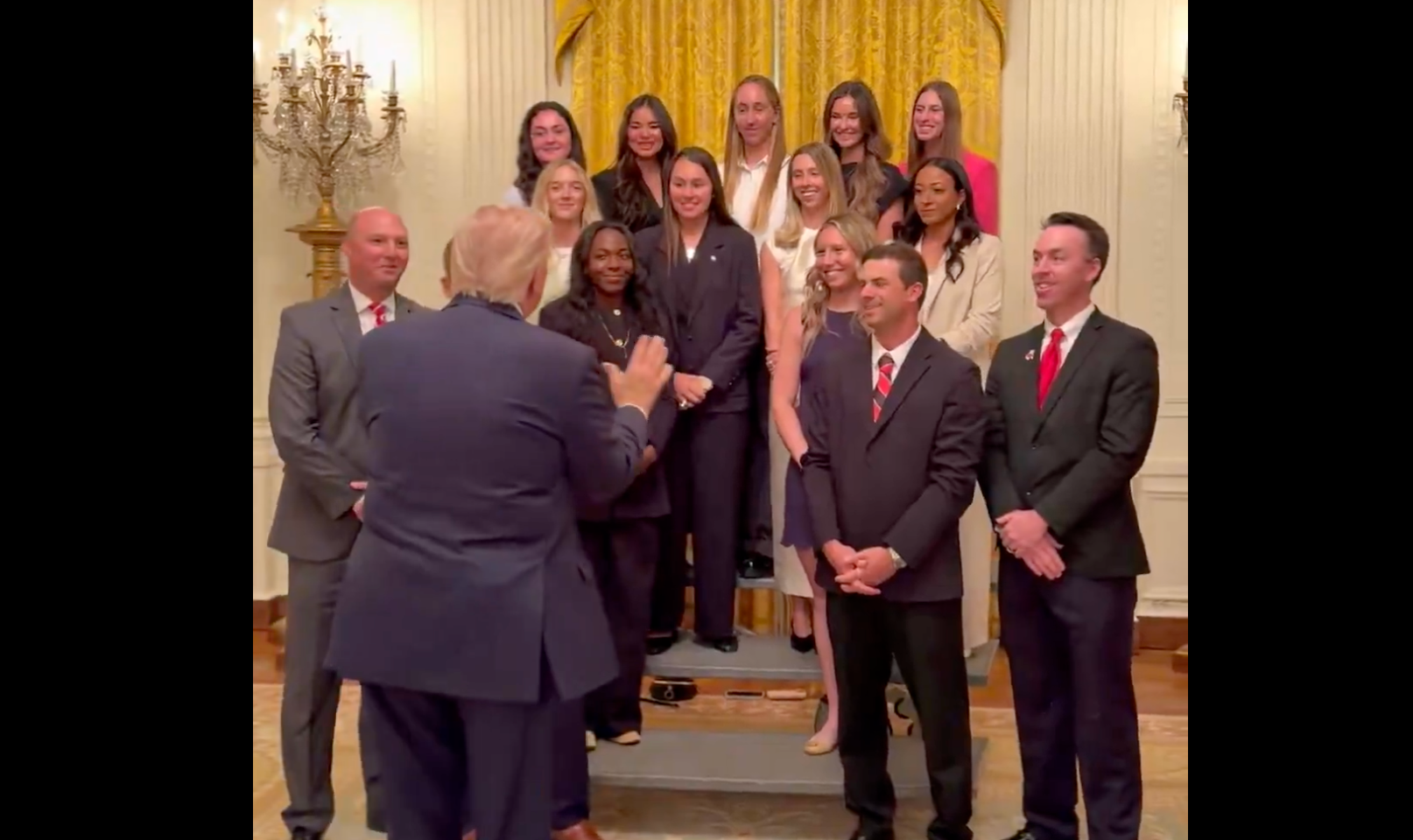 The UGA women's tennis team are national champions, but during a recent visit to the White House, they were posed behind men, sparking outcry.