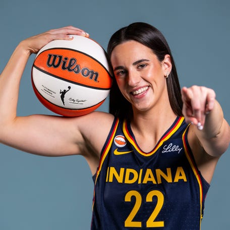 Indiana Fever guard Caitlin Clark (22) poses for a photo Wednesday, April 22, 2026, during media day at Gainbridge Fieldhouse in Indianapolis.
