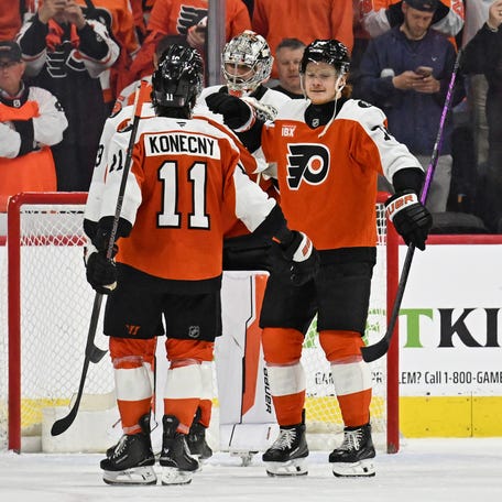 The Philadelphia Flyers celebrate a 5-2 win against the Pittsburgh Penguins.