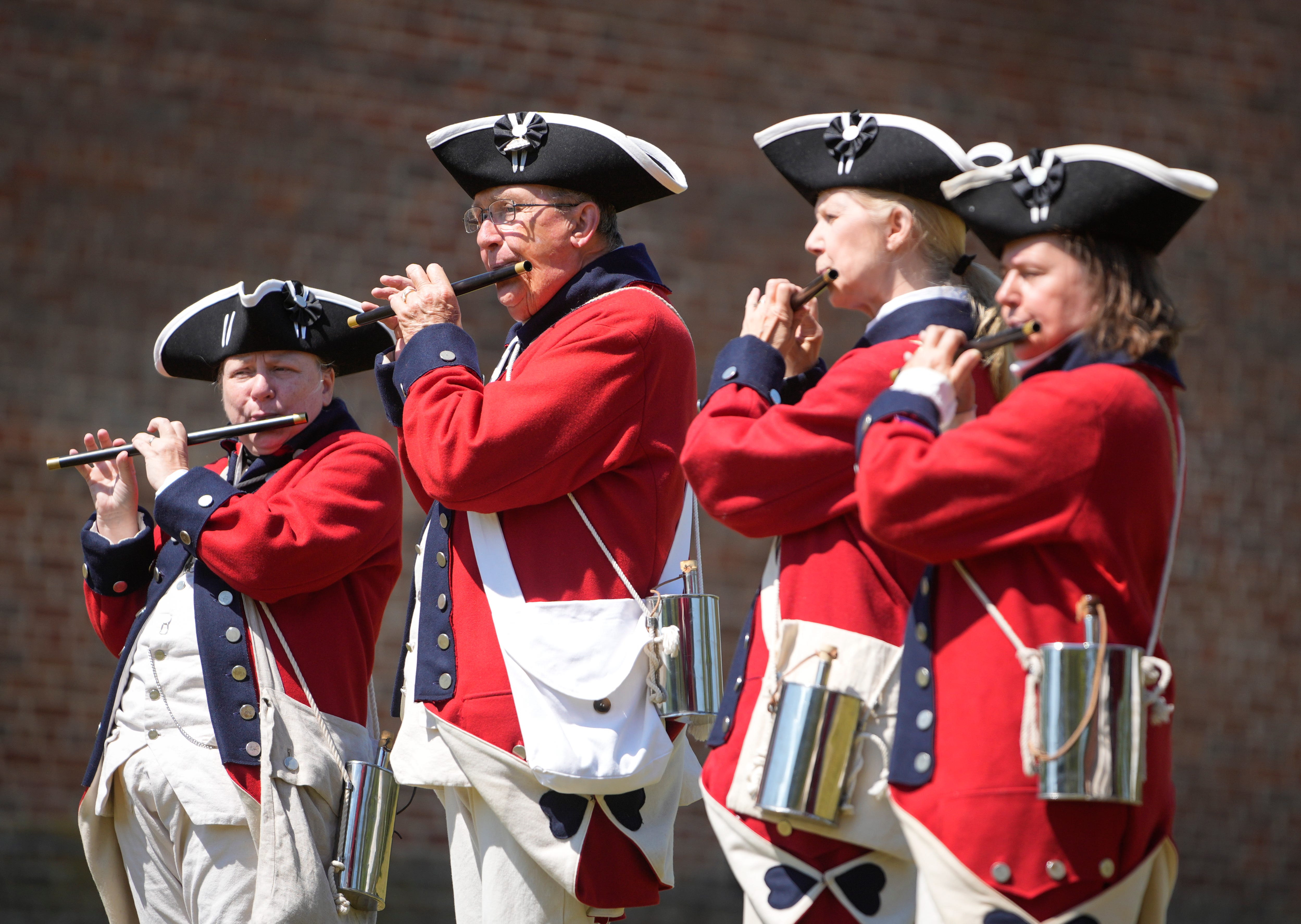 At a living history festival in North Carolina, visitors confront pride,
pain and unresolved questions about what it means to be American.