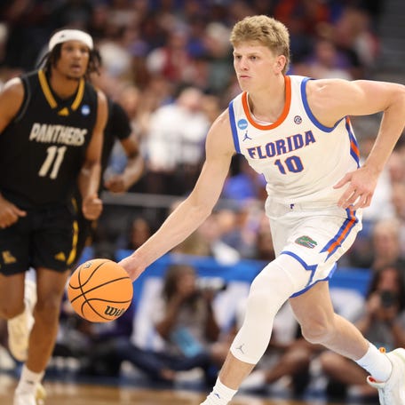 Florida forward Thomas Haugh (10) drives during the NCAA March Madness opening round at Benchmark international Arena in Tampa, FL on Friday, March 20, 2026. [Alan Youngblood/Gainesville Sun]