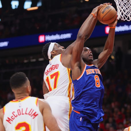 Atlanta Hawks forward Onyeka Okongwu (17) defends the shot of New York Knicks forward Og Anunoby (8) during Game 3 of their first-round playoff series on April 23, 2026.