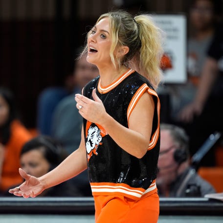 Oklahoma State coach Jacie Hoyt talks woth an official during a women's college basketball game between the Oklahoma State Cowgirls (OSU) and the Houston Cougars at Gallagher-Iba Arena in Stillwater, Saturday, Jan. 3, 2026.