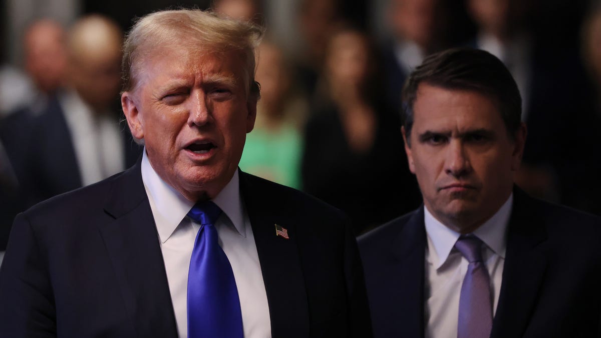 President Donald Trump and acting Attorney General Todd Blanche