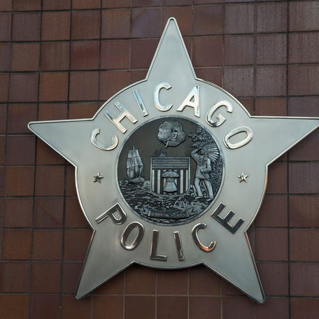 A Chicago police badge hangs in front of the City of Chicago Public Safety Headquarters on Dec. 1, 2015 in Chicago.