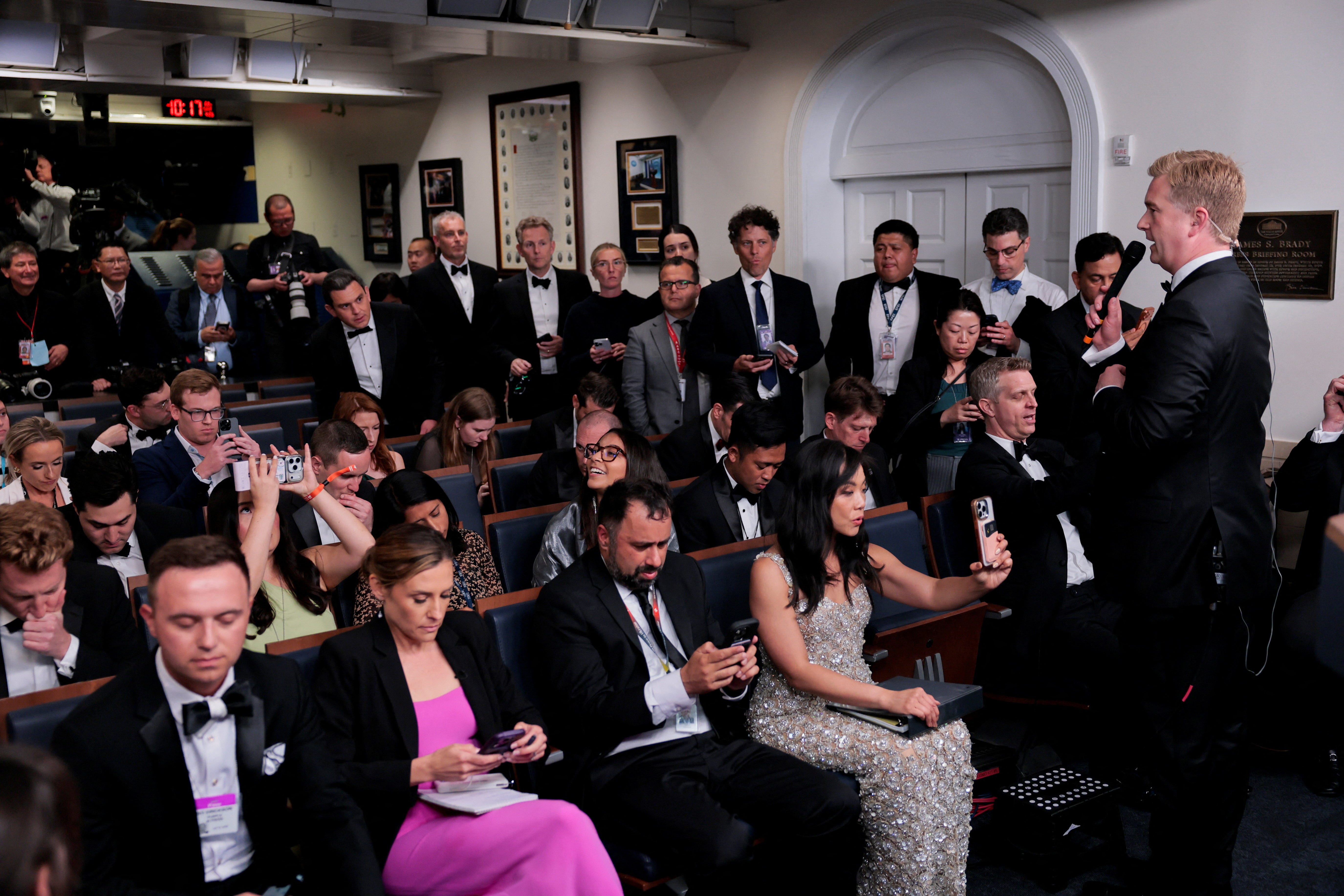 The president and reporters were dressed up for a party at the Washington Hilton. They ended up at the White House for a briefing on another shooting.