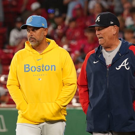 Alex Cora and Brian Snitker in 2023. Cora was fired by the Red Sox 27 games into the 2026 season.