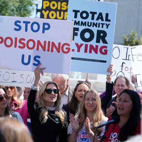 Protestors gather outside the Supreme Court as the Justices hearing arguments in Monsanto Company v. Durnell, on April 27, 2026, in Washington, DC. The Supreme Court will decide whether to block thousands of lawsuits alleging Monsanto failed to warn people that its popular weedkiller could cause cancer.