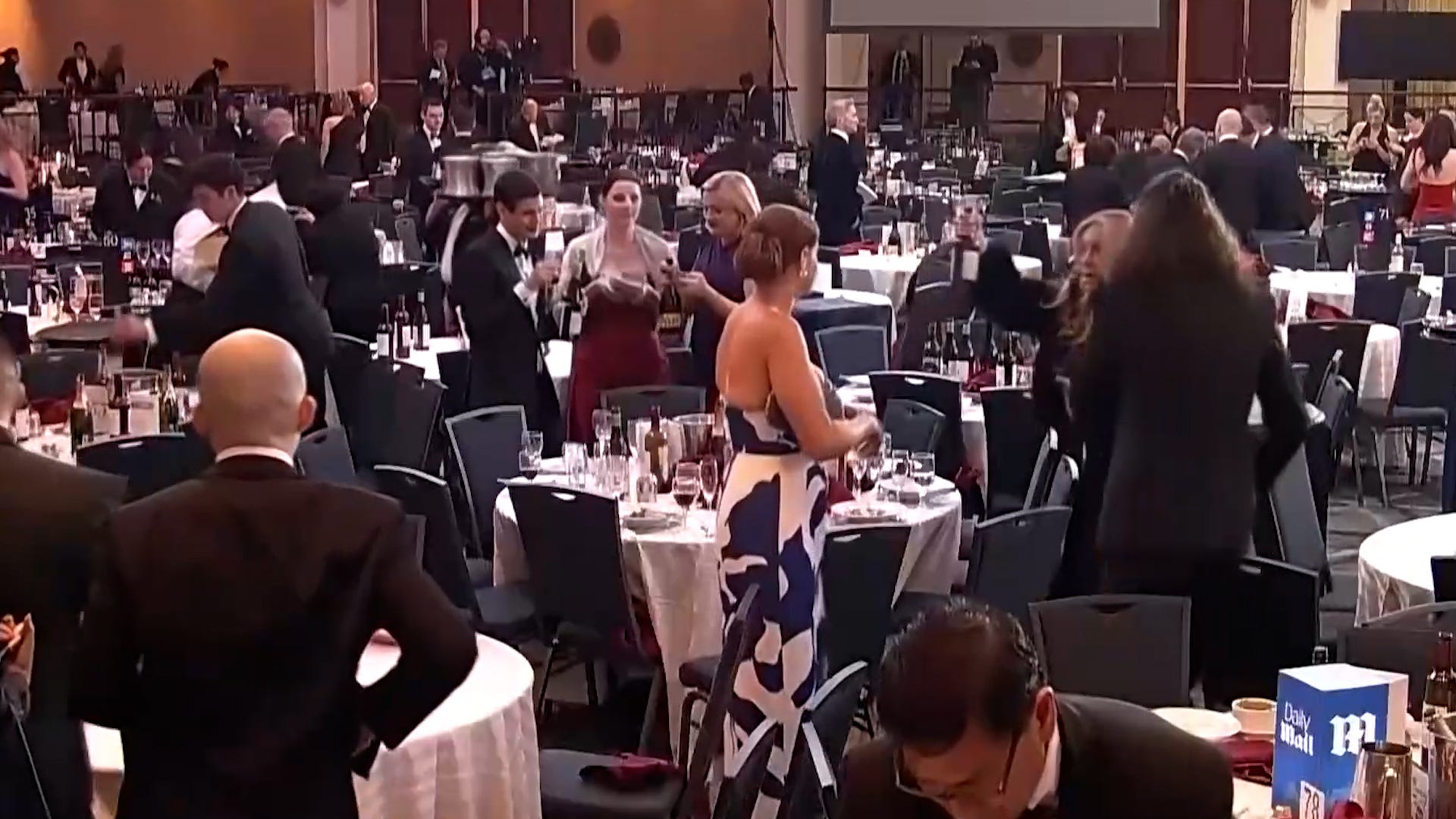 https://www.gannett-cdn.com/authoring/authoring-images/2026/04/27/USAT/89825935007-trnd-wine-bottle-grabbed-amid-whcd-chaos.jpg?auto=webp&crop=1919,1079,x0,y0&format=pjpg&width=1200