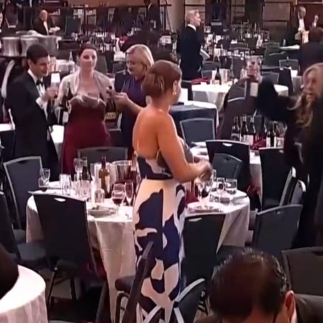 In the aftermath of the White House Correspondents’ Dinner shooting, guests were seen posing and grabbing wine bottles