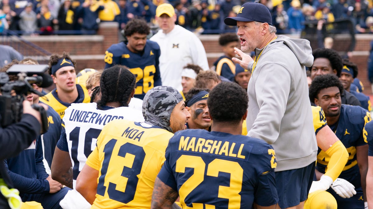 Head Coach Kyle Whittingham of the Michigan Wolverines speaks with his team following the Michigan Wolverines Football Spring Game at Michigan Stadium on April 18, 2026 in Ann Arbor, Michigan.