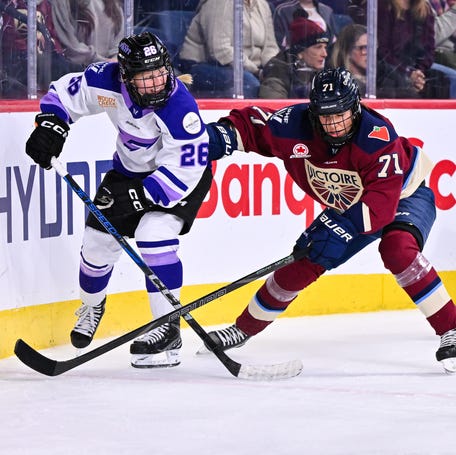 LAVAL, CANADA - JANUARY 17: Kendall Coyne Schofield #26 of the Minnesota Frost and Anna Kjellbin #71 of the Montreal Victoire skate against each other during the third period at Place Bell on January 17, 2025 in Laval, Quebec, Canada. The Montreal Victoire defeated the Minnesota Frost 4-2. (Photo by Minas Panagiotakis/Getty Images)