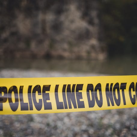 Police units react on the spot. A horrible crime near the river. Police line Do not cross