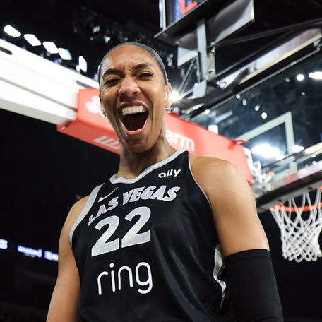 A'ja Wilson #22 of the Las Vegas Aces reacts after scoring a basket and drawing a foul against the Seattle Storm in the second quarter of their game at Michelob ULTRA Arena on Aug. 8, 2025 in Las Vegas, Nevada. The Aces defeated the Storm 90-86.
