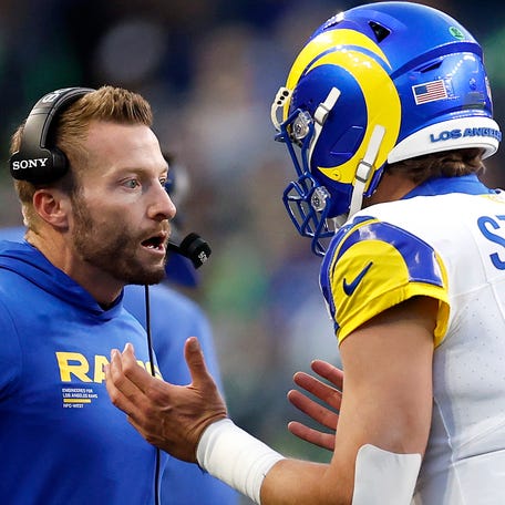 SEATTLE, WASHINGTON - JANUARY 25: Head coach Sean McVay talks with Matthew Stafford #9 of the Los Angeles Rams during the second quarter against the Seattle Seahawks in the NFC Championship game at Lumen Field on January 25, 2026 in Seattle, Washington. (Photo by Ronald Martinez/Getty Images)