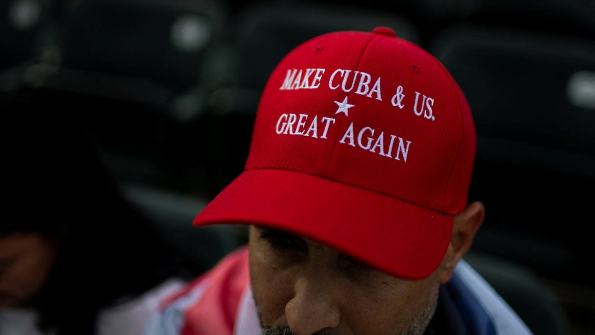 A man attends a Cuban-exile community gathering for a "Free-Cuba" rally in downtown Miami, Florida, U.S., April 26, 2026.