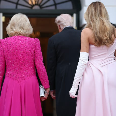 Queen Camilla and first lady Melania Trump enter the White House for a state dinner on April 28, 2026 in Washington, DC.