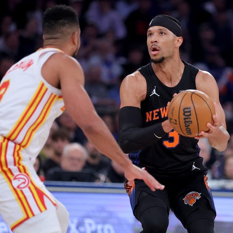 New York Knicks guard Josh Hart (3) looks to shoot the ball against Atlanta Hawks guard CJ McCollum (3) during Game 2 of their first-round playoff series on April 20, 2026.