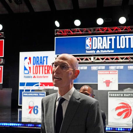 Commissioner Adam Silver walks through the audience during the 2025 NBA Draft Lottery.
